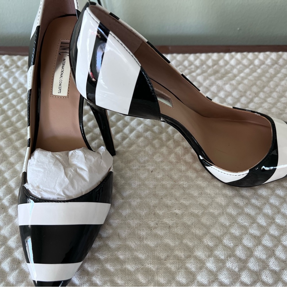 Women’s BNWT size 8 INC black and white striped heels.